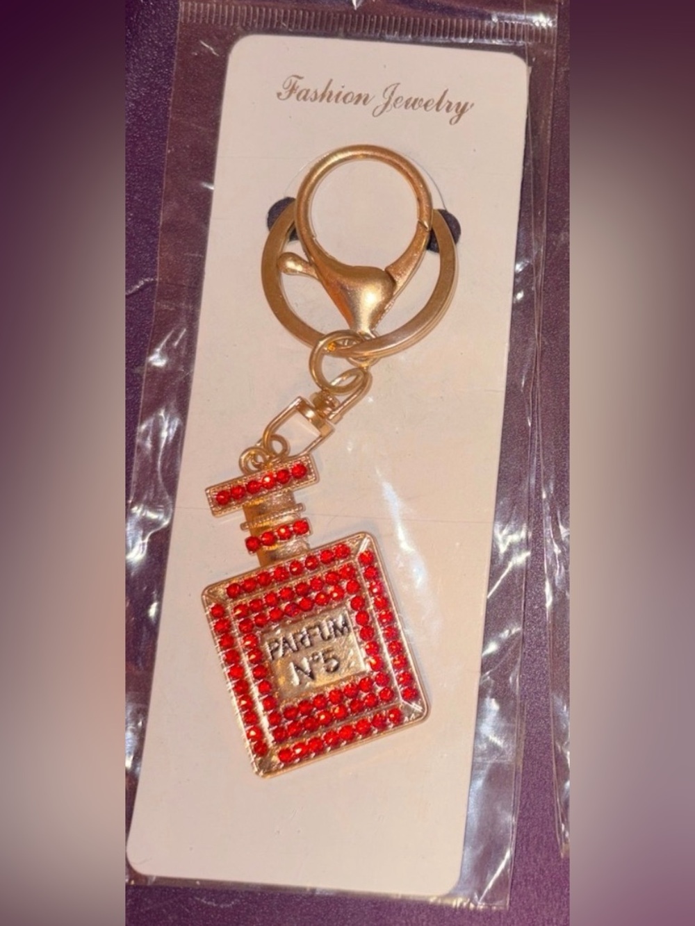 Charms NWT feature Gold tone hardware